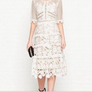 14. True Decadence Lace Midi Dress